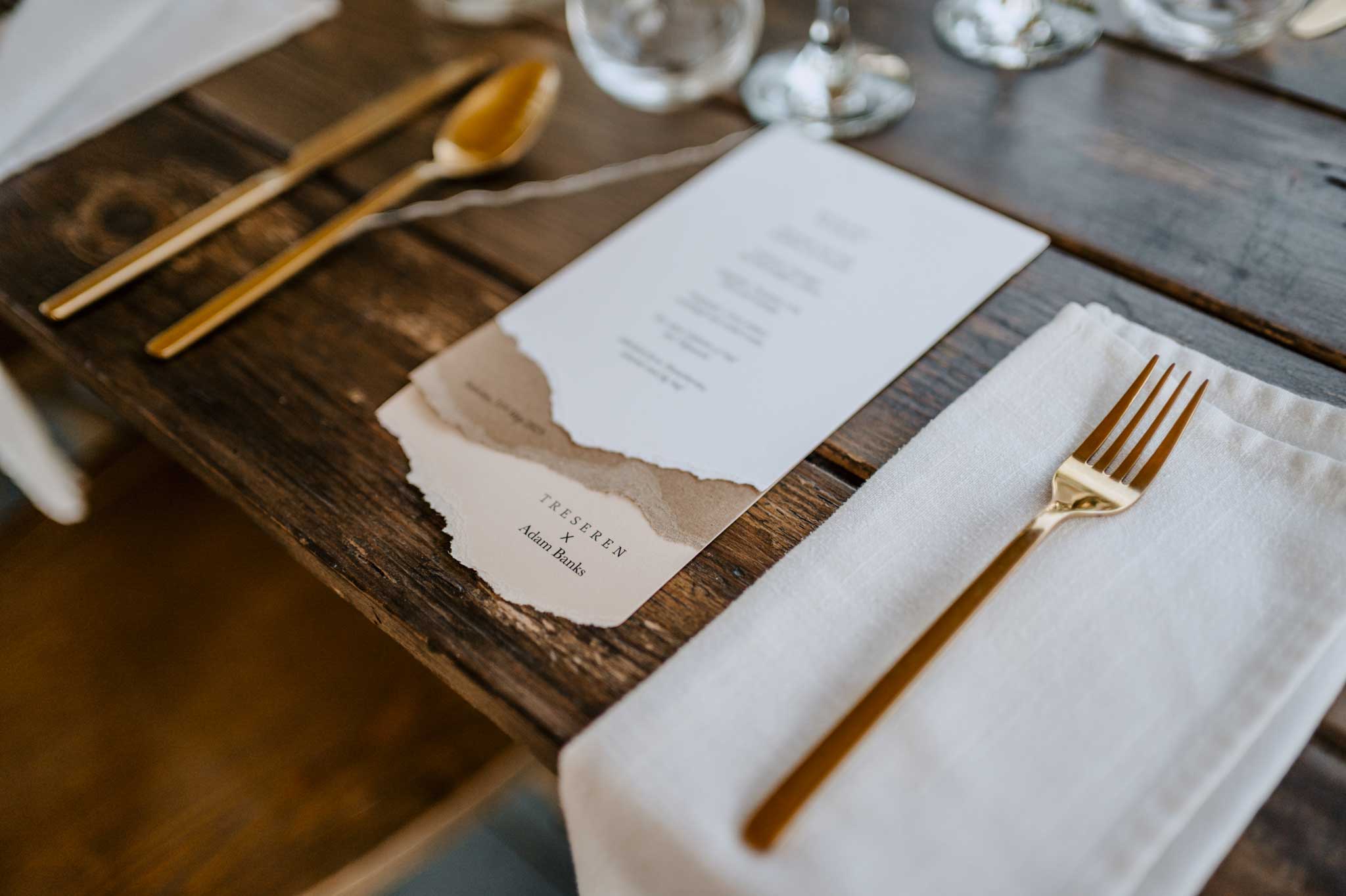 Adam Banks supper club at Treseren dining table with menu by Scalet Paperie