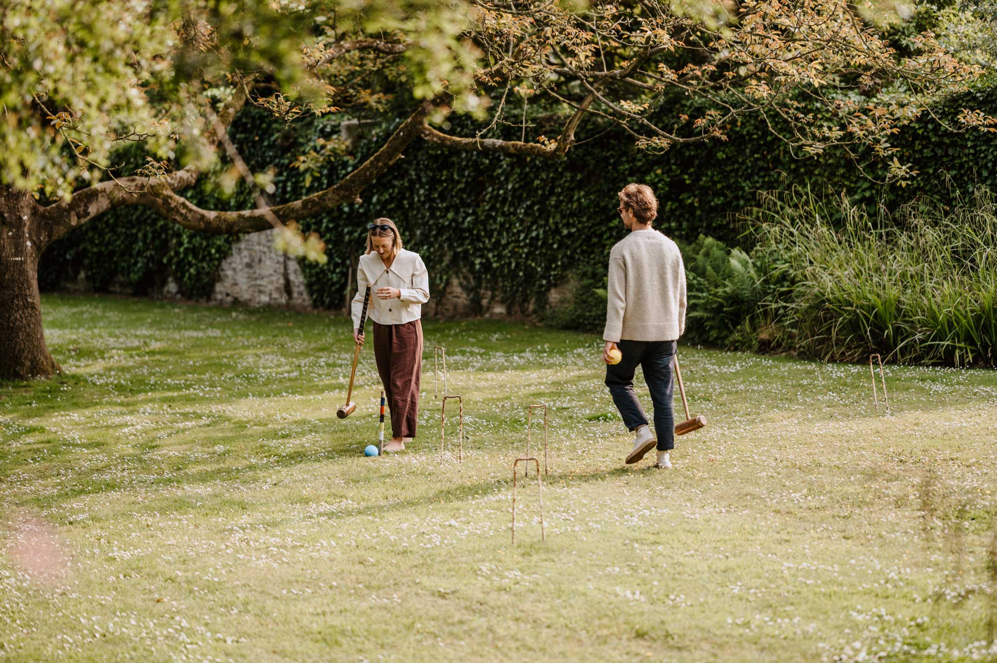 guests playing croquet at Treseren green gardens