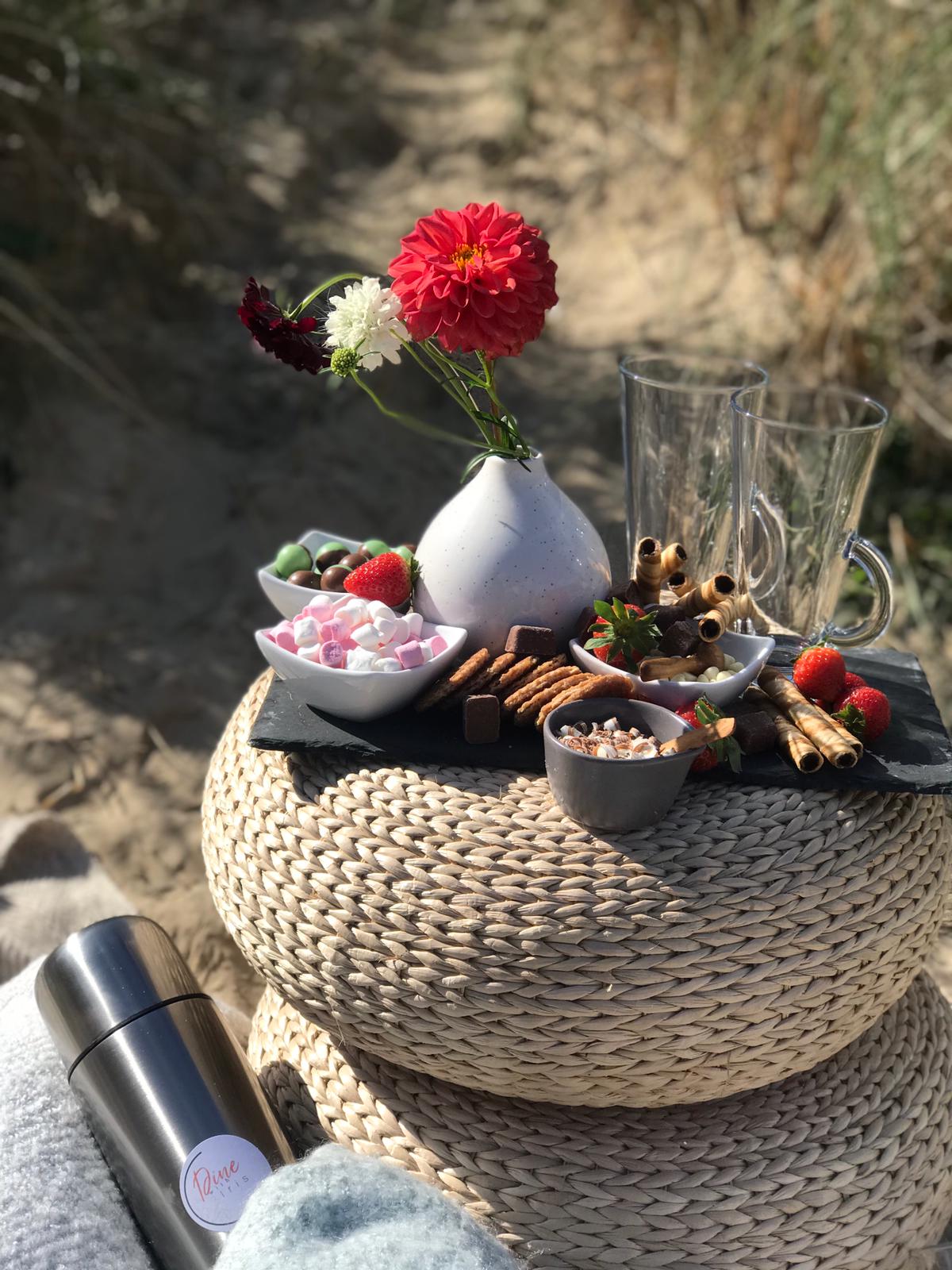 bespoke picnic setup on the beach
