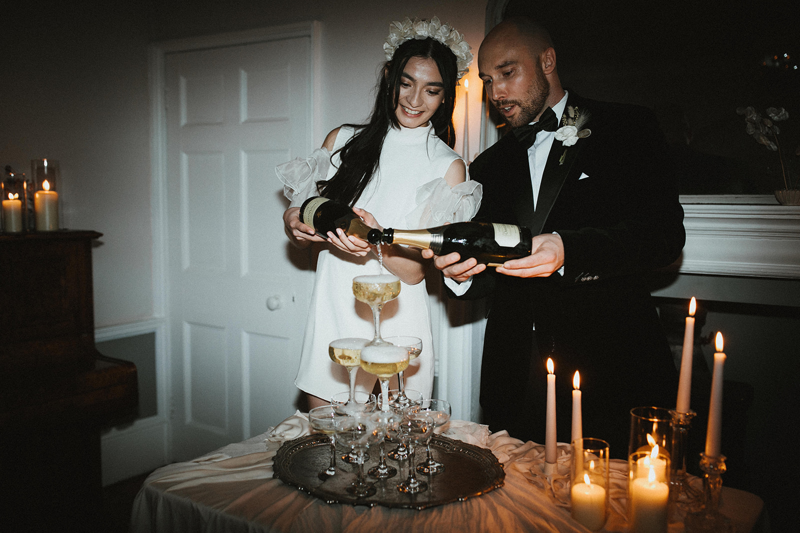 Wedding couple pouring Camel Valley sparkling wine