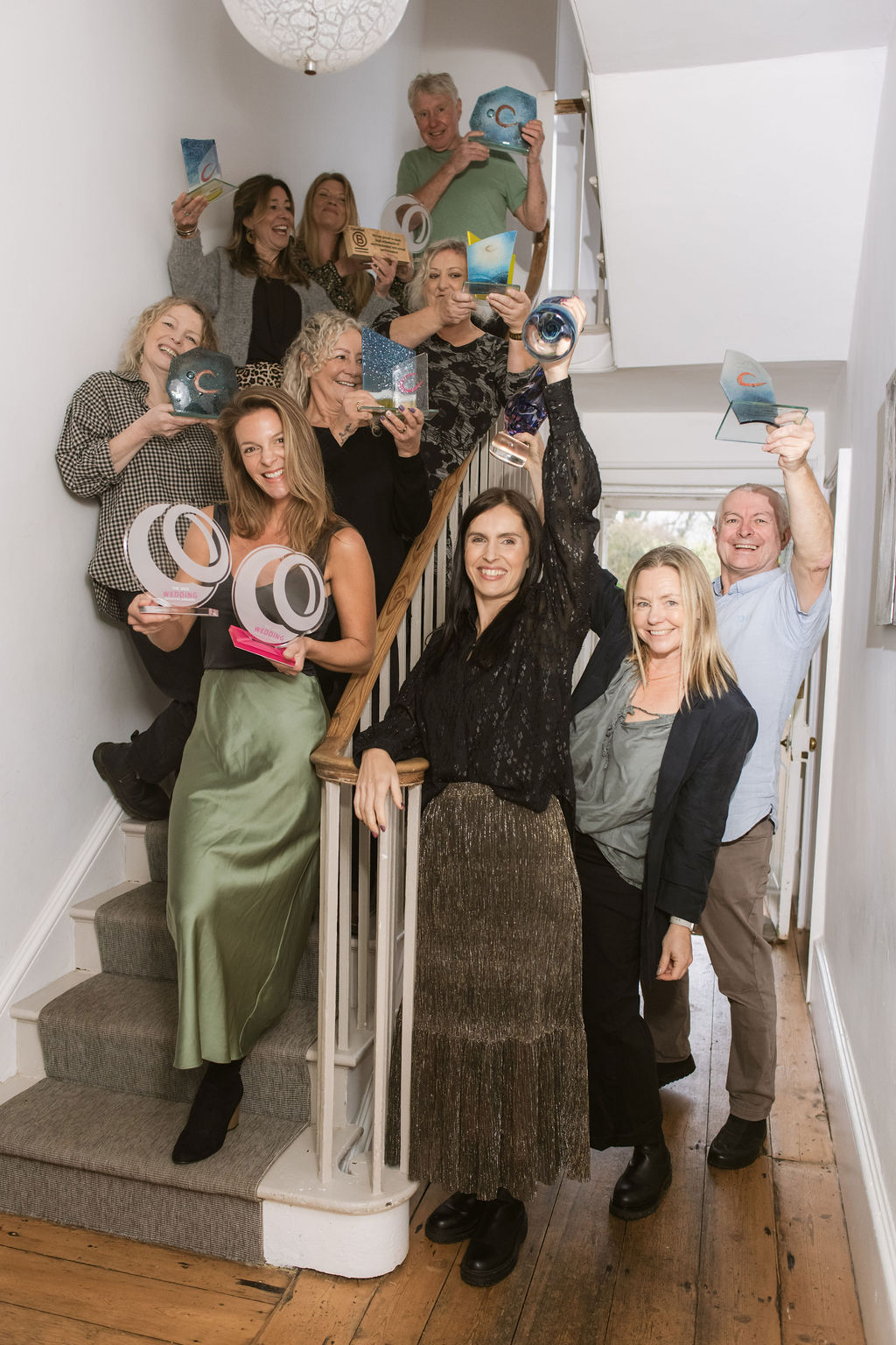 award winning small wedding venue Treseren team holding awards