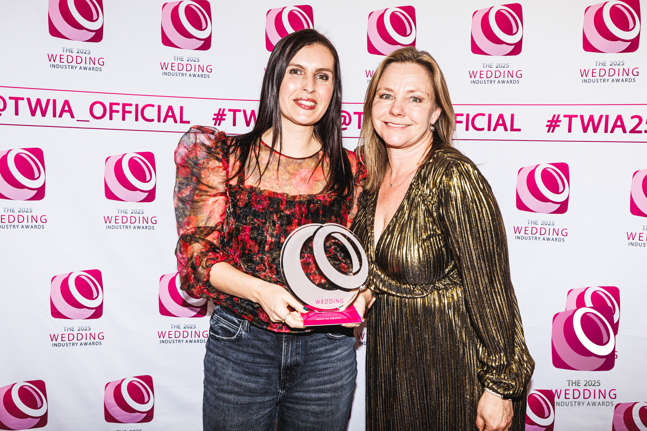Emma and Izzy from Treseren collecting award for wedding venue of the year at the TWIA Wedding Industry awards 2025