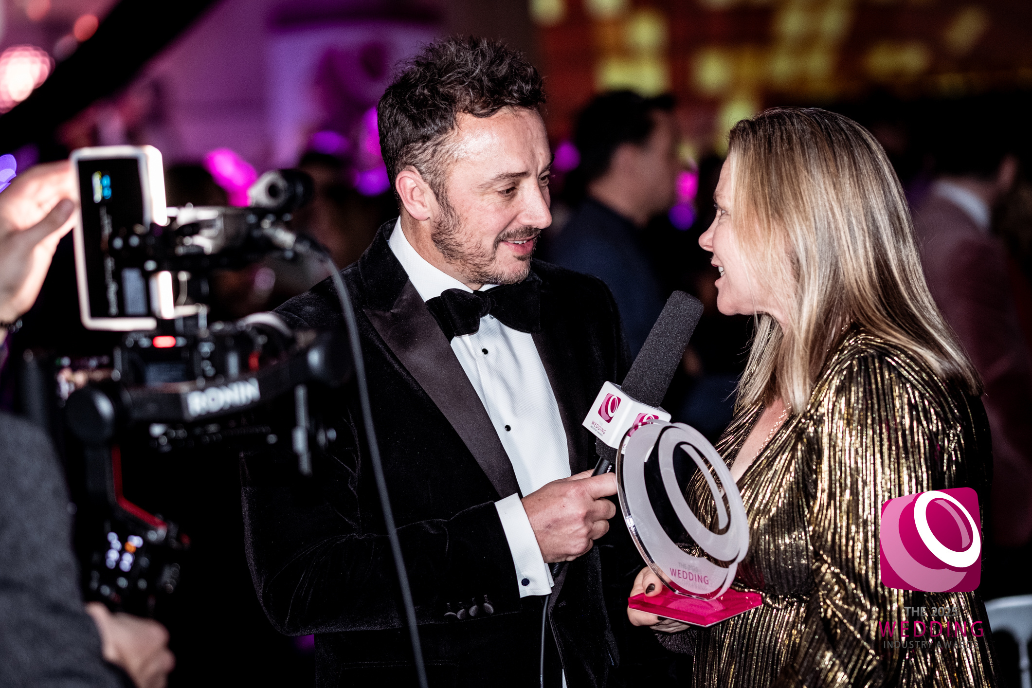 Treseren founder Emma being interviewed by Damian Bailey at the 2025 TWIA Wedding Industry Awards