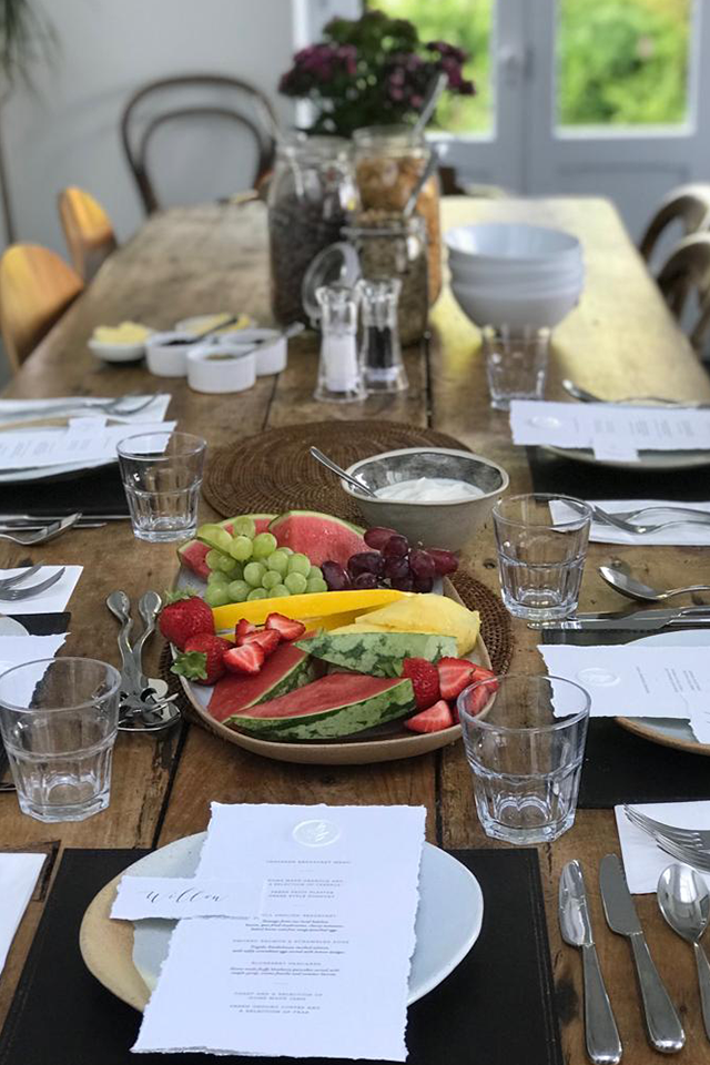 Table set for wedding breakfast with handwritten menus