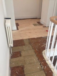 bare wooden floorboads in Georgian house renovation